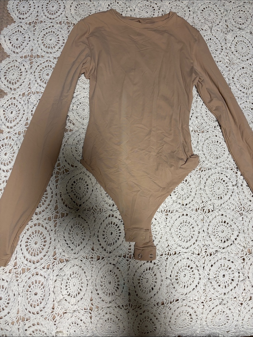 SKIMS Long Sleeve Bodysuit in Tan